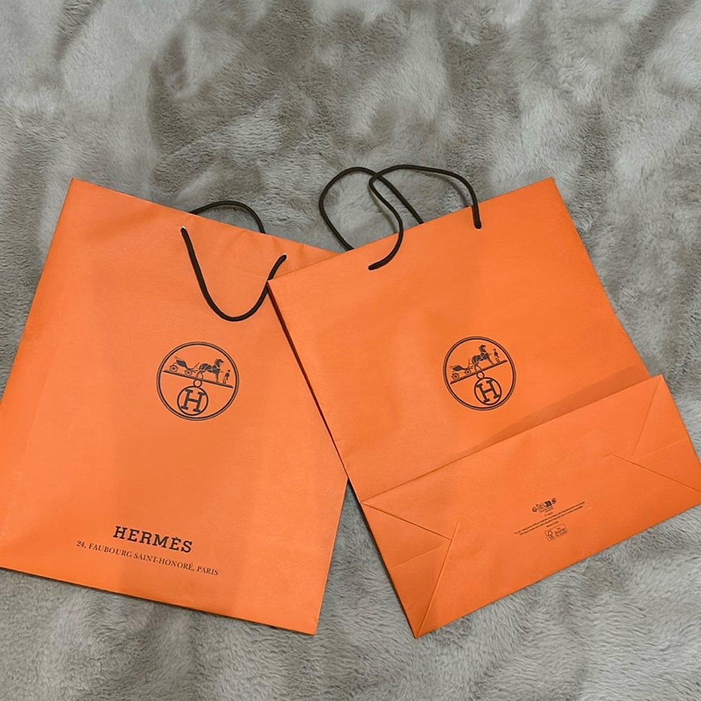 Two large Hermes paper bags